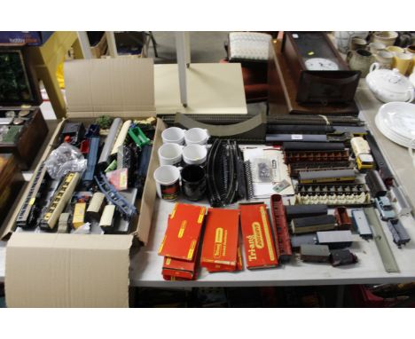 A collection of Hornby and model railway items and various accessories and six mugs