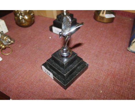 Spirit of Ecstasy model on granite  