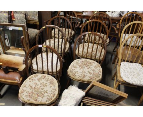 A set of seven Ercol dining chairs