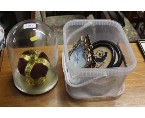 A box of pictures and prints to include silhouettes and a model crown under dome