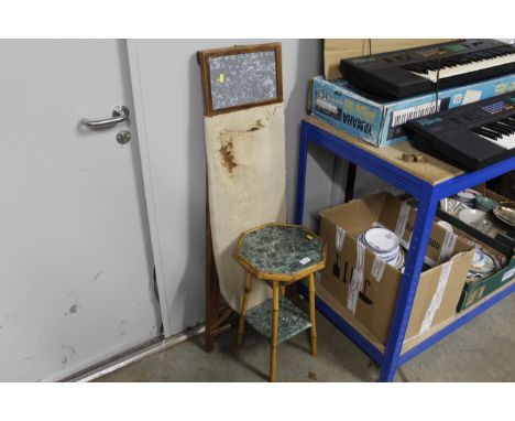 A vintage ironing board and a bamboo two tier occasional table