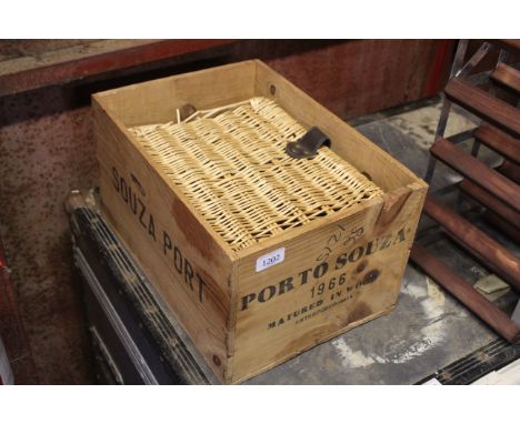 A wooden crate for 'Porto Souza' and a small wicker hamper