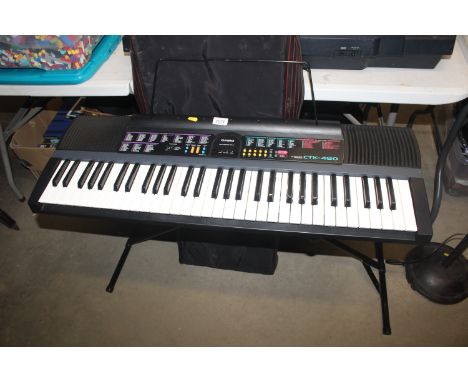 A Casio CTK-480 Keyboard and stand