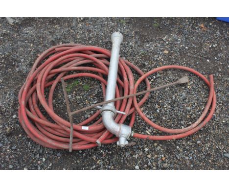 A hydrant stand pipe and quantity of hose