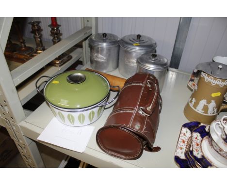 A cased set of bowling balls, three retro type kitchen storage jars, rolling pin and a saucepan