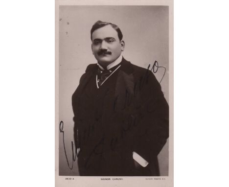 CARUSO ENRICO: (1873-1921) Italian Tenor. Vintage signed postcard photograph of Caruso standing in a three quarter length po