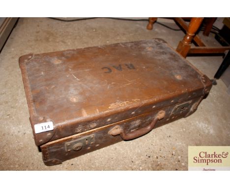 A vintage suitcase and contents of various ephemera and newspapers