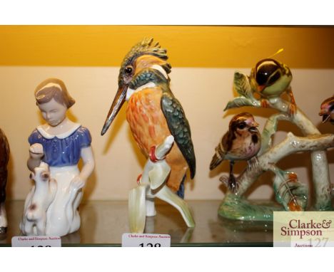 A Goebel porcelain figure of a woodpecker 
