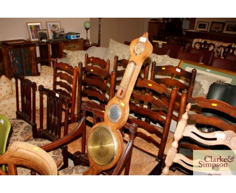 A Victorian banjo shaped barometer