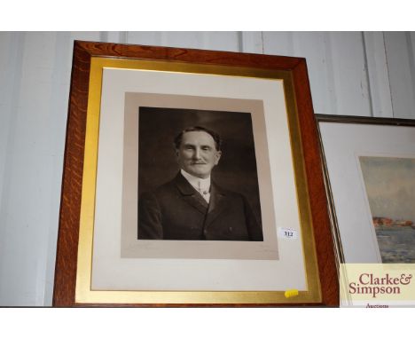 An early 20th Century black and white portrait study in oak and gilt frame 