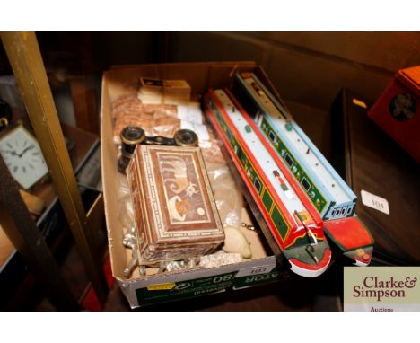 A box of various miscellaneous items to include inlaid Eastern trinket box, opera glasses, cigarette cards, carved wooden ite