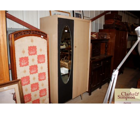 A Lebus Link gent's wardrobe with mirrored panel door 