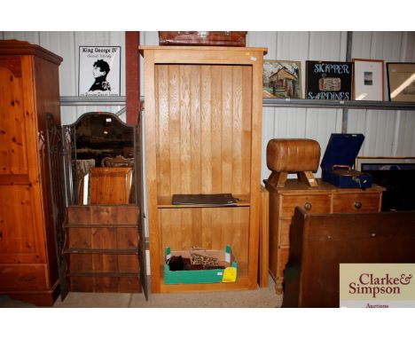 A light oak open fronted bookcase with adjustable shelves