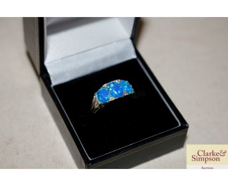 A 925 and triple opal coloured dress ring 