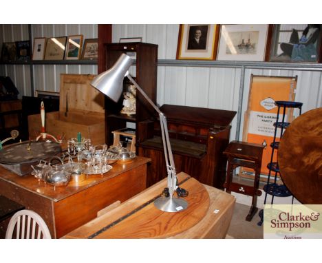An aluminium finish large angle poise type lamp