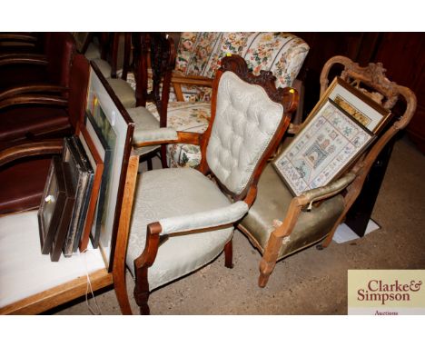 An Edwardian mahogany framed armchair with button upholstery