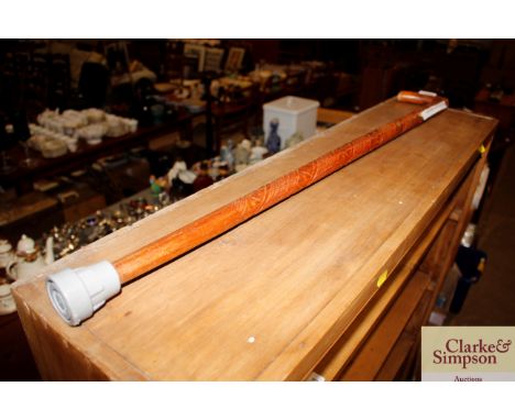 A carved hardwood walking stick 