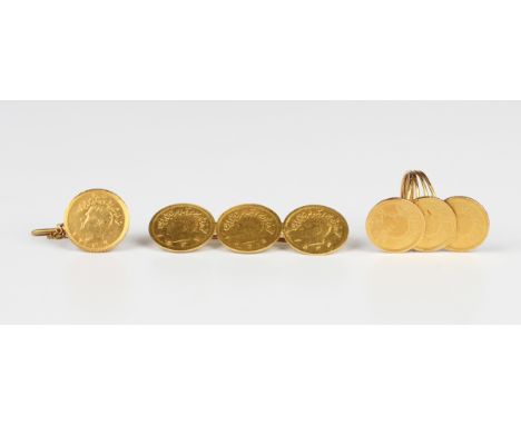 Three Iranian half-pahlavi coins, mounted as a brooch, width 5cm, another half-pahlavi, mounted as a tie stud with a gilt met