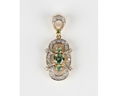 A gold, demantoid garnet and varicoloured diamond drop shaped pendant, mounted with three circular cut demantoid garnets with