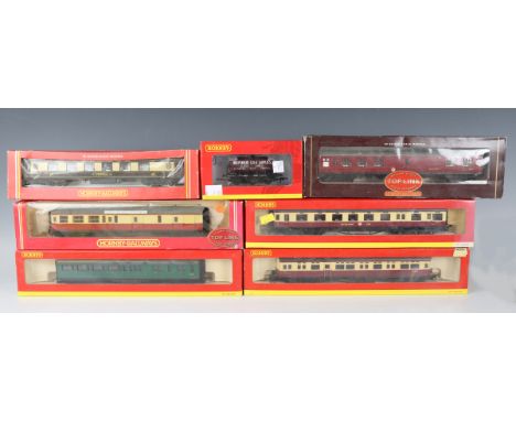 A small collection of Hornby and Hornby Railways gauge OO coaches and goods rolling stock, including R.4124D BR brake coach S