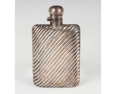 A late Victorian silver hip flask with diagonally ribbed decoration, Chester 1896 by Stokes &amp; Ireland Ltd, weight 81g, he