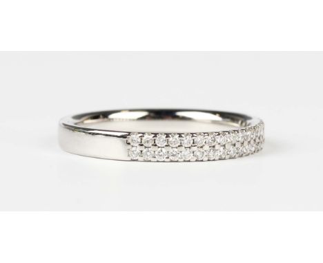 A platinum and diamond half eternity ring, mounted with two rows of circular cut diamonds, unmarked, weight 3.2g, total diamo