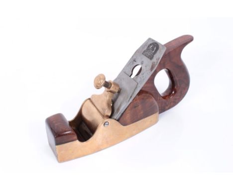 Woodworking tools, Isaac Sorby Victorian Smoothing Plane with walnut handle and brass base. With manufacturer's mark.