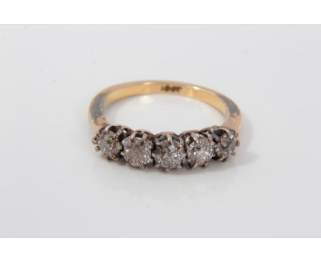 Gold (18ct) five stone diamond ring, with five old cut diamonds in claw setting, ring size NCondition report: Weight approxim