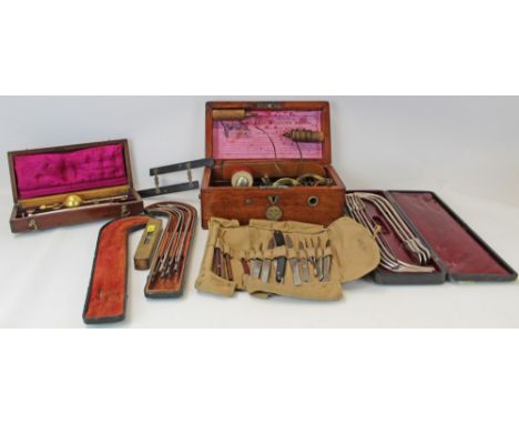 Collection of miscellaneous medical instruments, including two cased sets of Urology Sound Instruments, set of scalpels, Sike