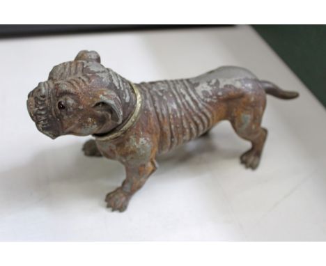 An amusing vintage novelty cold painted spelter lighter in the form of a bulldog, the lighter concealed by the hinged dog’s h