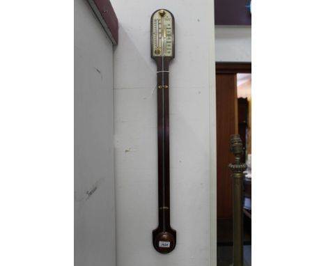 Mahogany stick barometer with visible mercury tube and enclosed bulb, separate thermometer and manually operated Venier slide