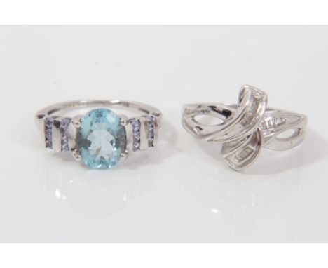 White gold (9ct) diamond set bow shaped ring, size K and white gold (9ct) aquamarine ring, size J (2)Condition report: Total 