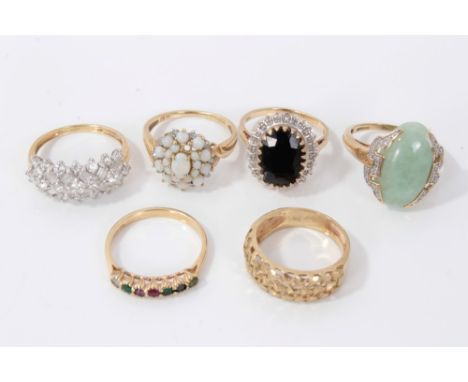 Six gold and gem set rings comprising of five gold (9ct) dress rings and a gold (14ct) synthetic white stone cluster ringCond