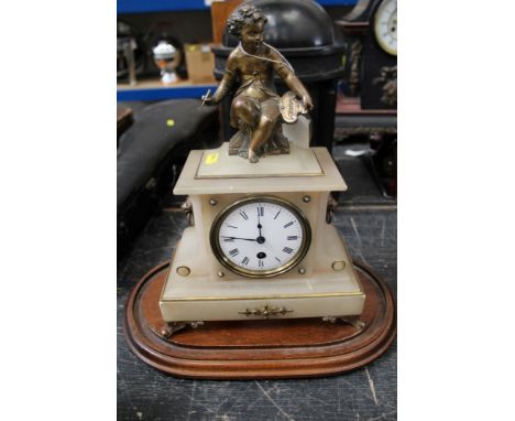 19th Century French alabaster mantel clock, of architectural form with classical cherub surmount and circular white enamel di