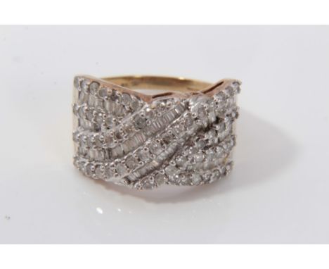 Ladies 9ct gold diamond dress ring in cross-over setting