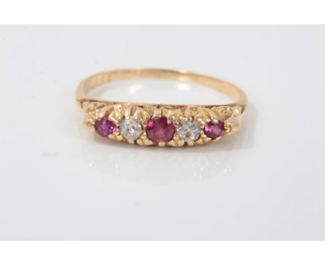 Diamond and ruby five stone ring with three round mixed cut rubies interspaced with two old cut diamonds, in gold claw and sc