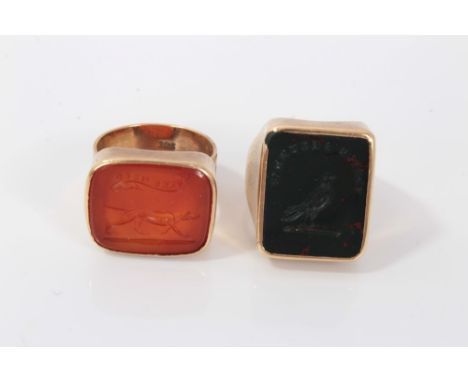 Gold (9ct) seal fob ring with carved carnelian plaque depicting a dog 'Take Heed', size K, and one other gold seal ring with 