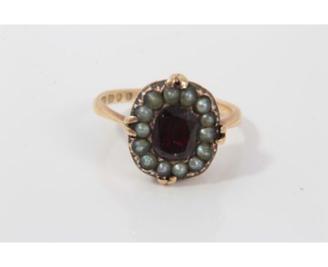 Gold (18ct) ruby and seed pearl ring, size LCondition report: The centre piece of the ring was possibly a Georgian brooch put