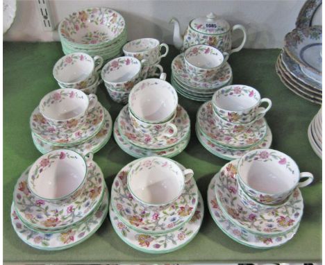 A collection of Minton Haddon Hall pattern wares comprising teapot, sixteen cups, seventeen saucers and fourteen tea plates, 