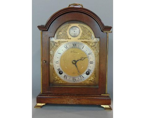 Elliot twin train miniature bracket type clock, the gilt dial with silvered chapter ring, striking on a bell, 23cm high, key 