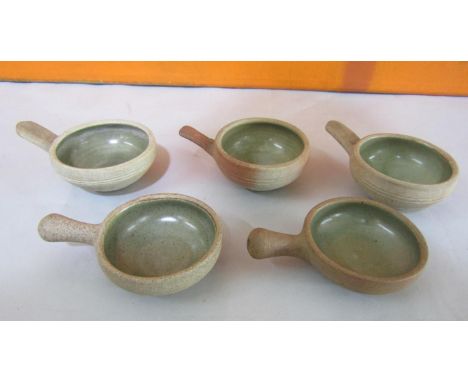 Probably by Bernard Leach - Three St Ives pottery wine tasting cups with celadon glaze interior, 13cm long, together with a f