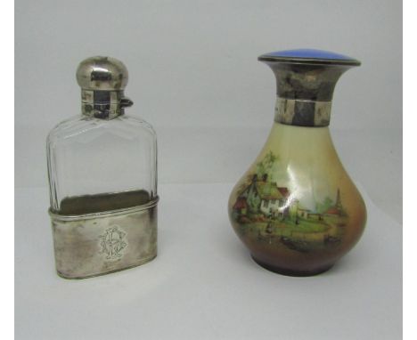 A cut glass and silver mounted pocket flask with locking cap, Birmingham 1901, together with a porcelain toilet water bottle 