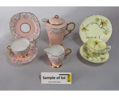 A collection of Royal Stafford tea wares in the art deco manner with floral decoration on a peach coloured ground comprising 