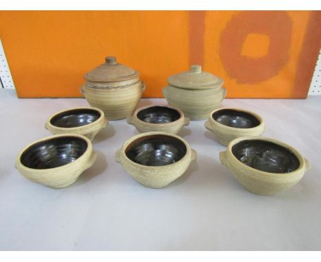 Leach style St Ives studio pottery brown glazed cookware comprising six soup bowls and two lidded tureens, the tureens 19cm d
