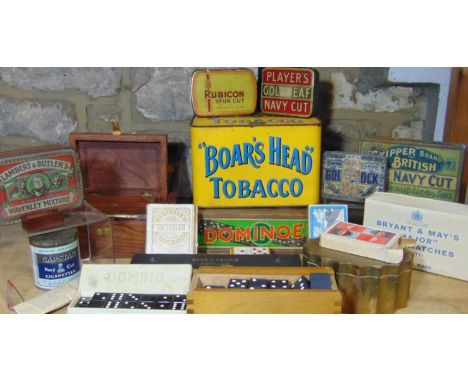 A collection of vintage tins, together with a number of games including a bone and ebony domino set (complete) a miniature bo