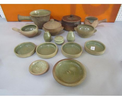 A collection of Leach type St Ives Pottery celadon glazed cookware comprising two twin handled bowls (af) one with lid, toget