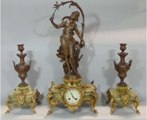 French spelter figural garniture mantel clock, the 3 inch twin train enamel dial with painted Arabic numerals and foliate spr