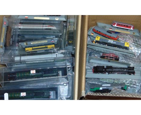 Large 'Del Prado'collection of N gauge worldwide model engines, each displayed on a stand with engine name and country of ori