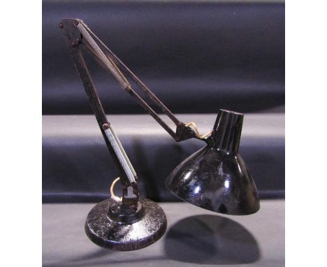 A vintage industrial anglepoise lamp with black painted finish 