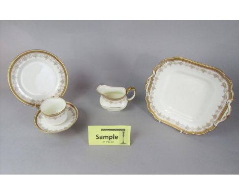 A collection of Aynsley teawares with gilt border decoration including cake plate, milk jug, sugar bowl, twelve cups, twelve 